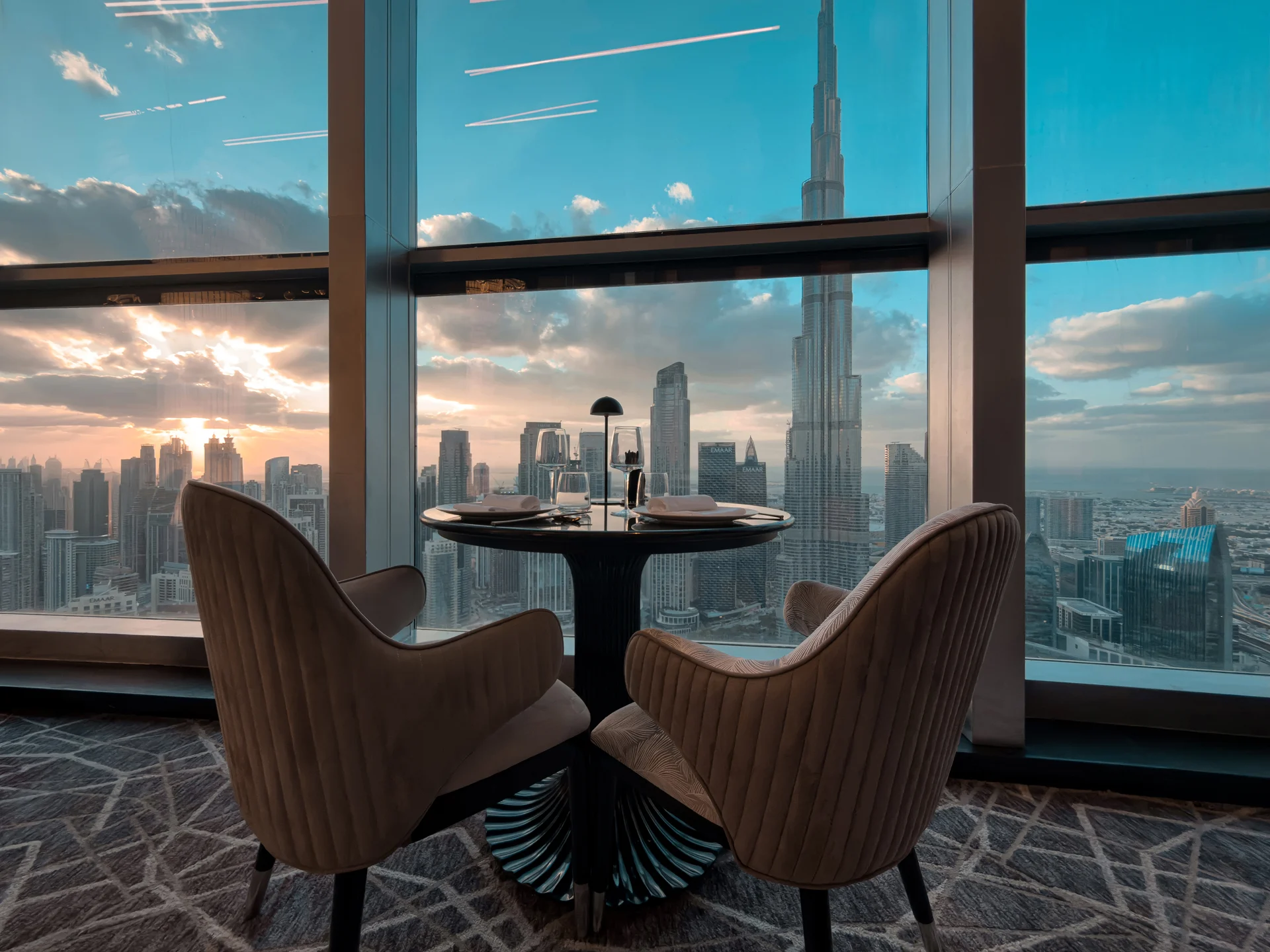 Private table at BIRDS Dubai overlooking the Burj Khalifa skyline.