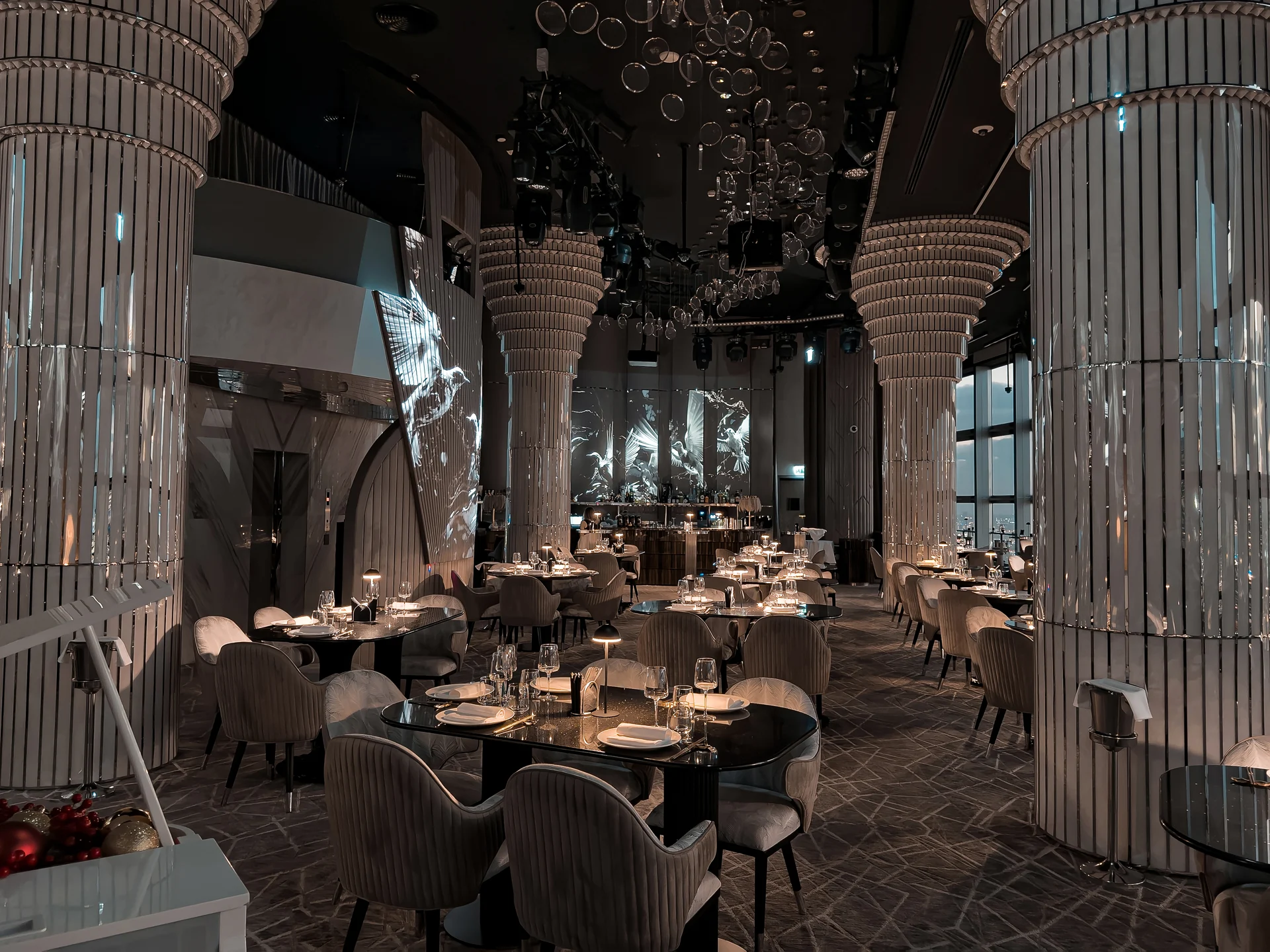 Theatrical dining interior at BIRDS Dubai.
