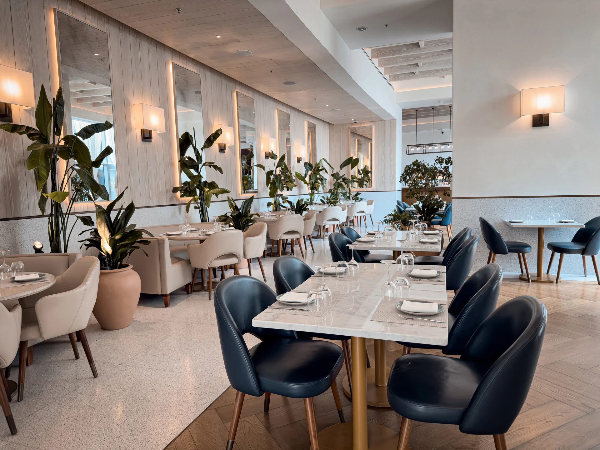 Elegant restaurant dining area at The Abu Dhabi EDITION Hotel.
