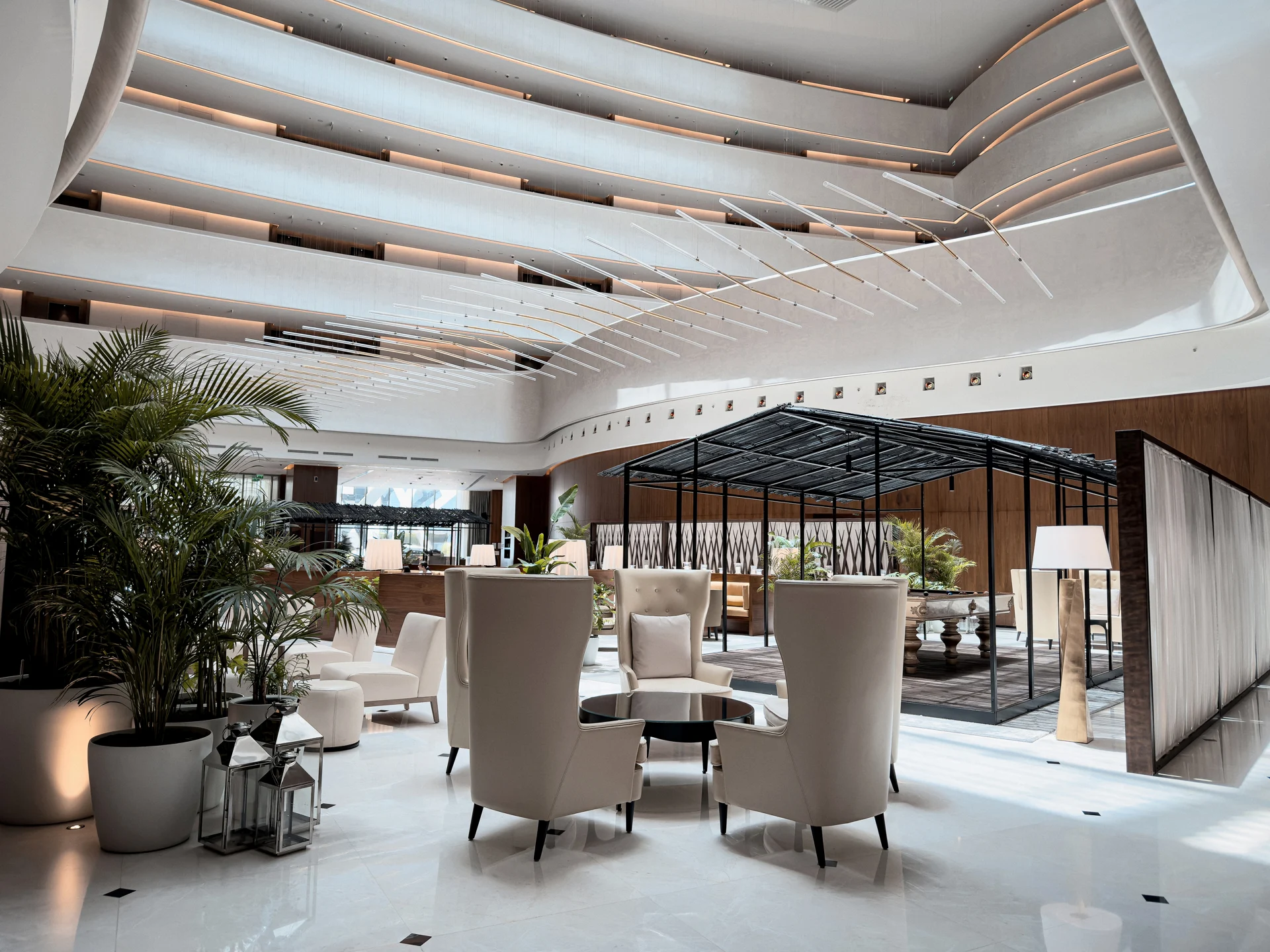 Terrace at The Abu Dhabi EDITION Hotel overlooking the waterfront.