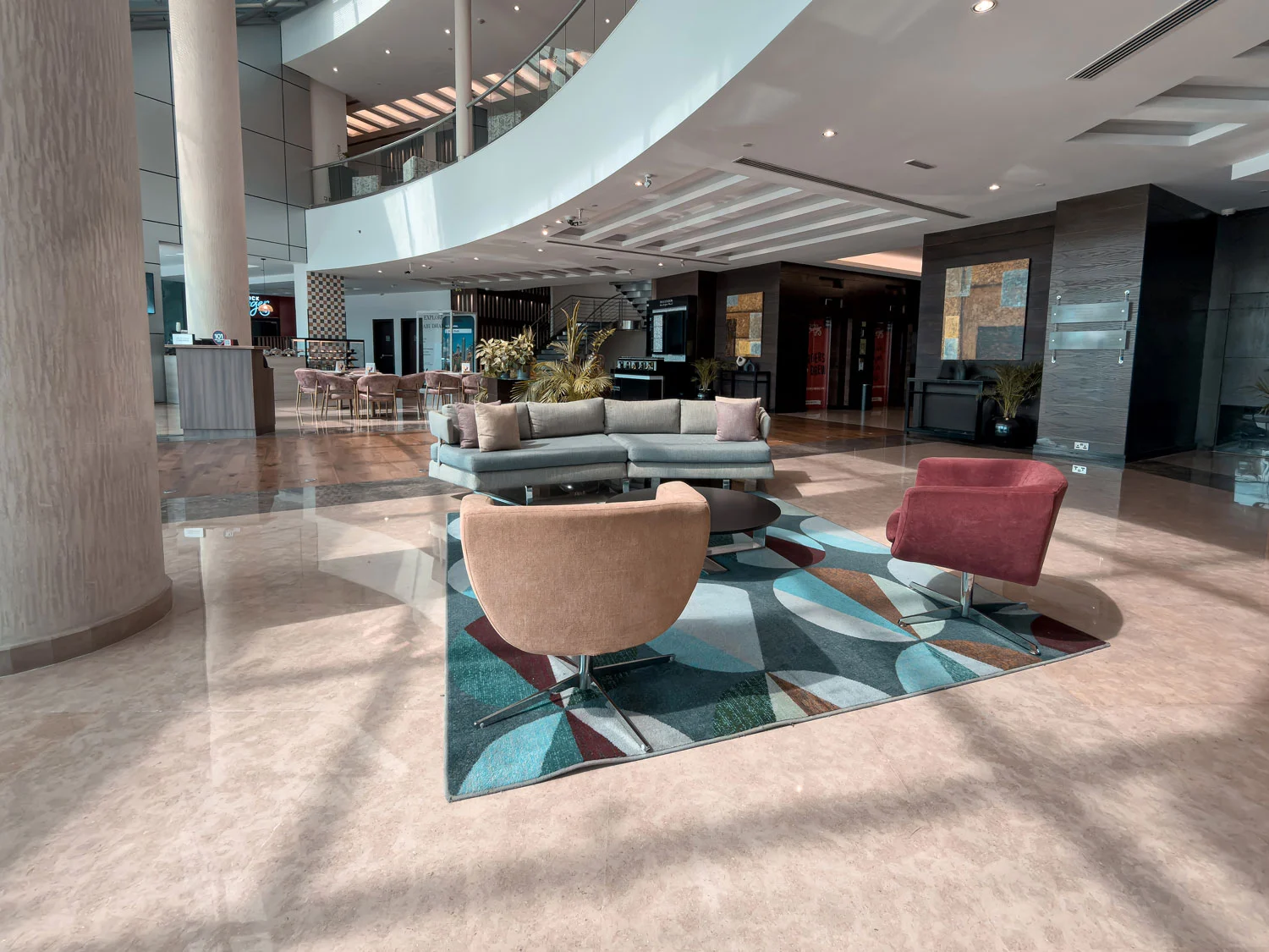 Lobby seating area at Holiday Inn Abu Dhabi.