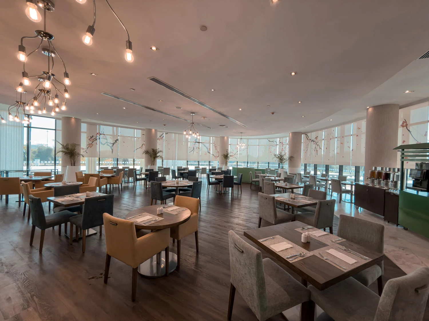Restaurant dining area at Holiday Inn Abu Dhabi.