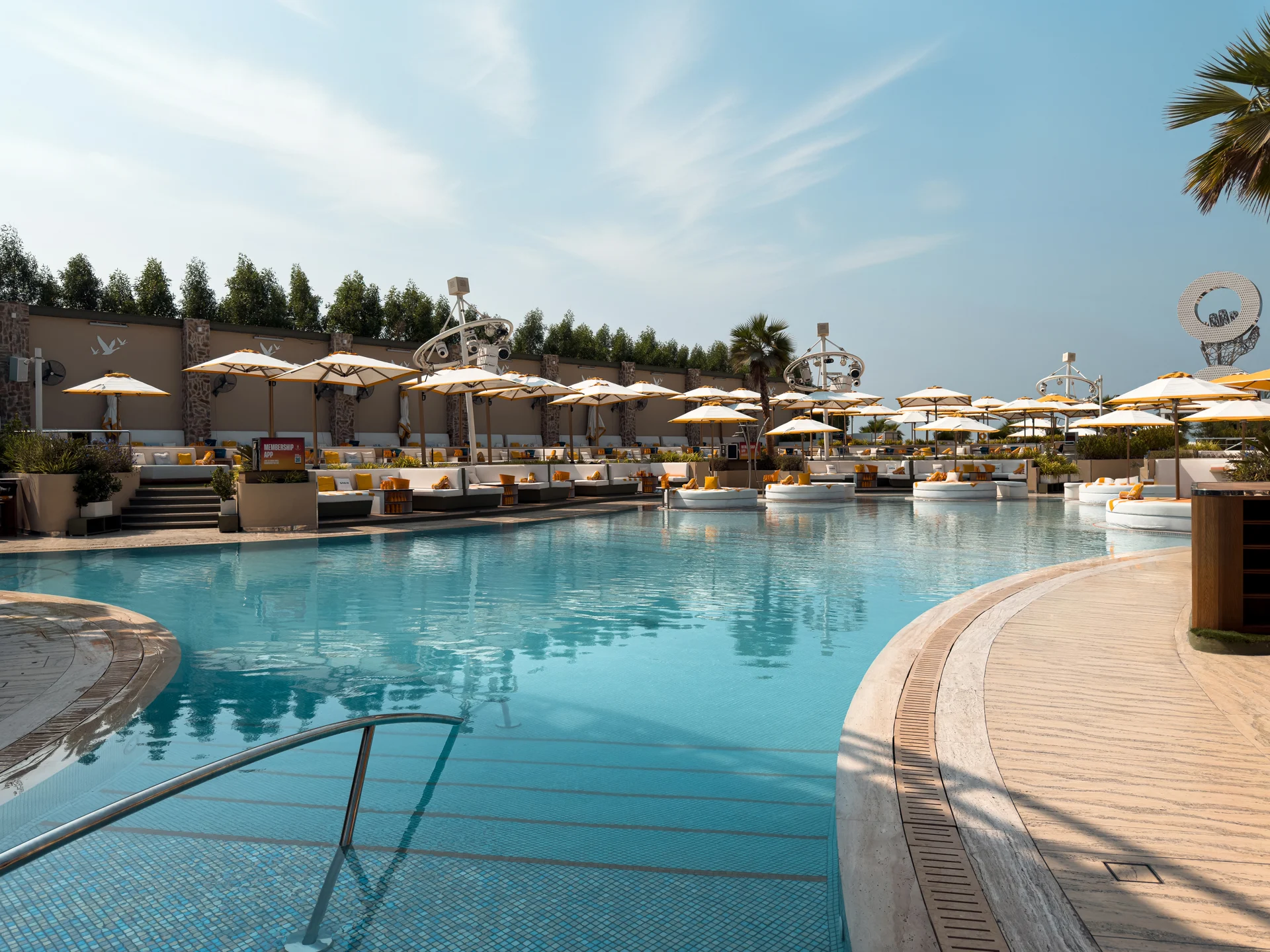 Curved pool architecture at O Beach Dubai.