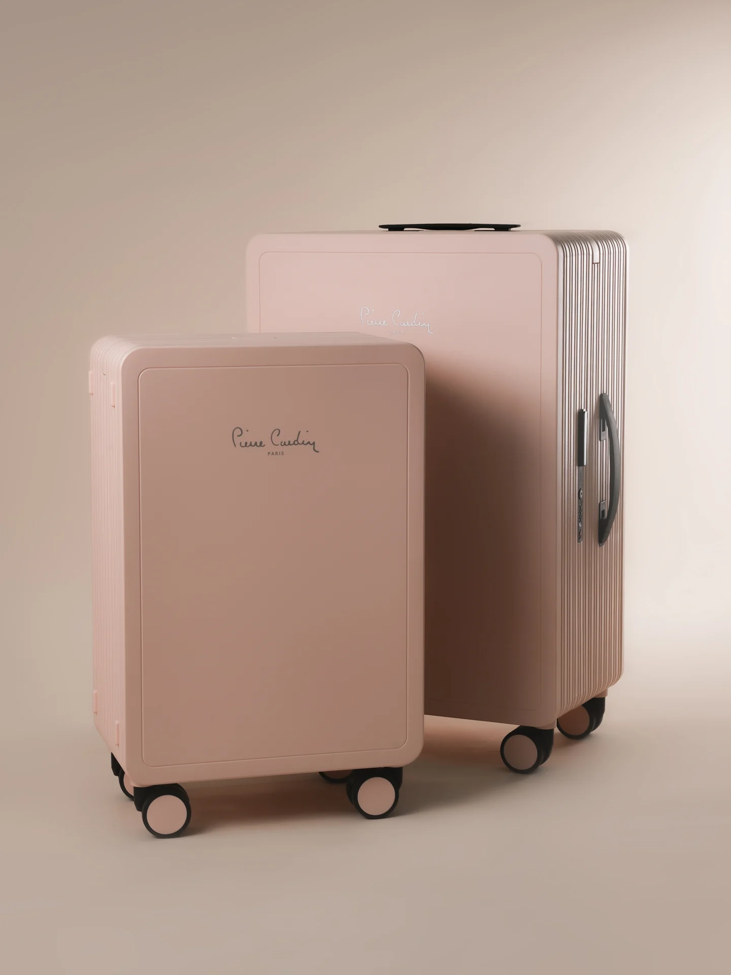 Rose Pierre Cardin Osaka luggage set in studio.